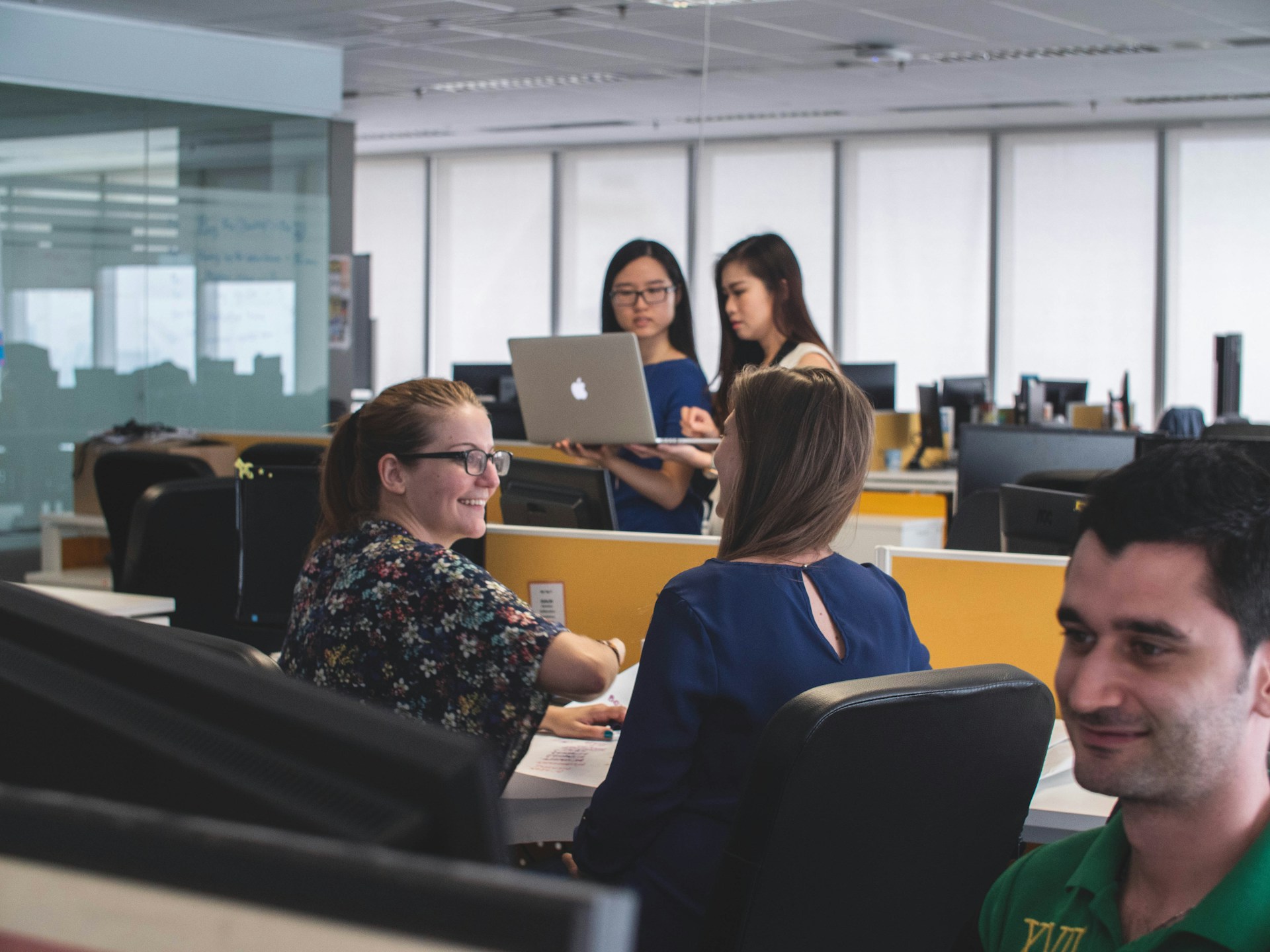 Stygian team collaborating in the office